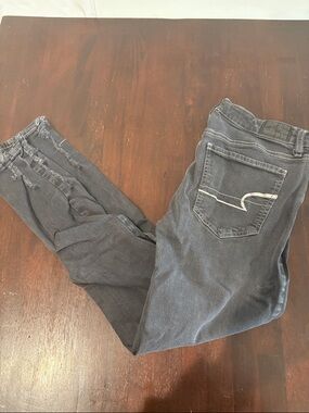 American Eagle Outfitters Women’s Black Skinny Jeans with Distressed Hem